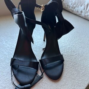 Black high heels with bow